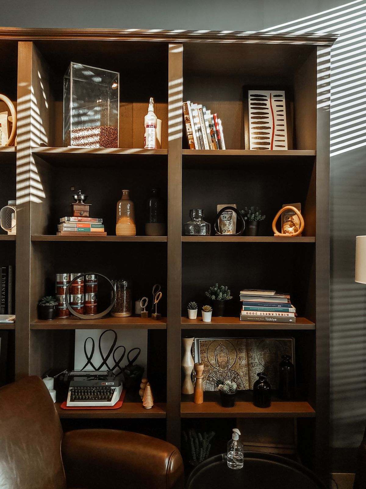 Home bookshelf with books and decorative objects