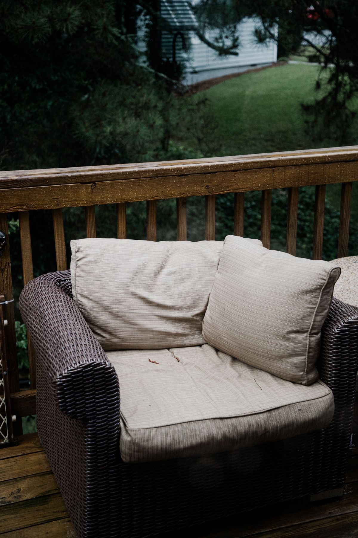 Wicker garden chair with soft cushions
