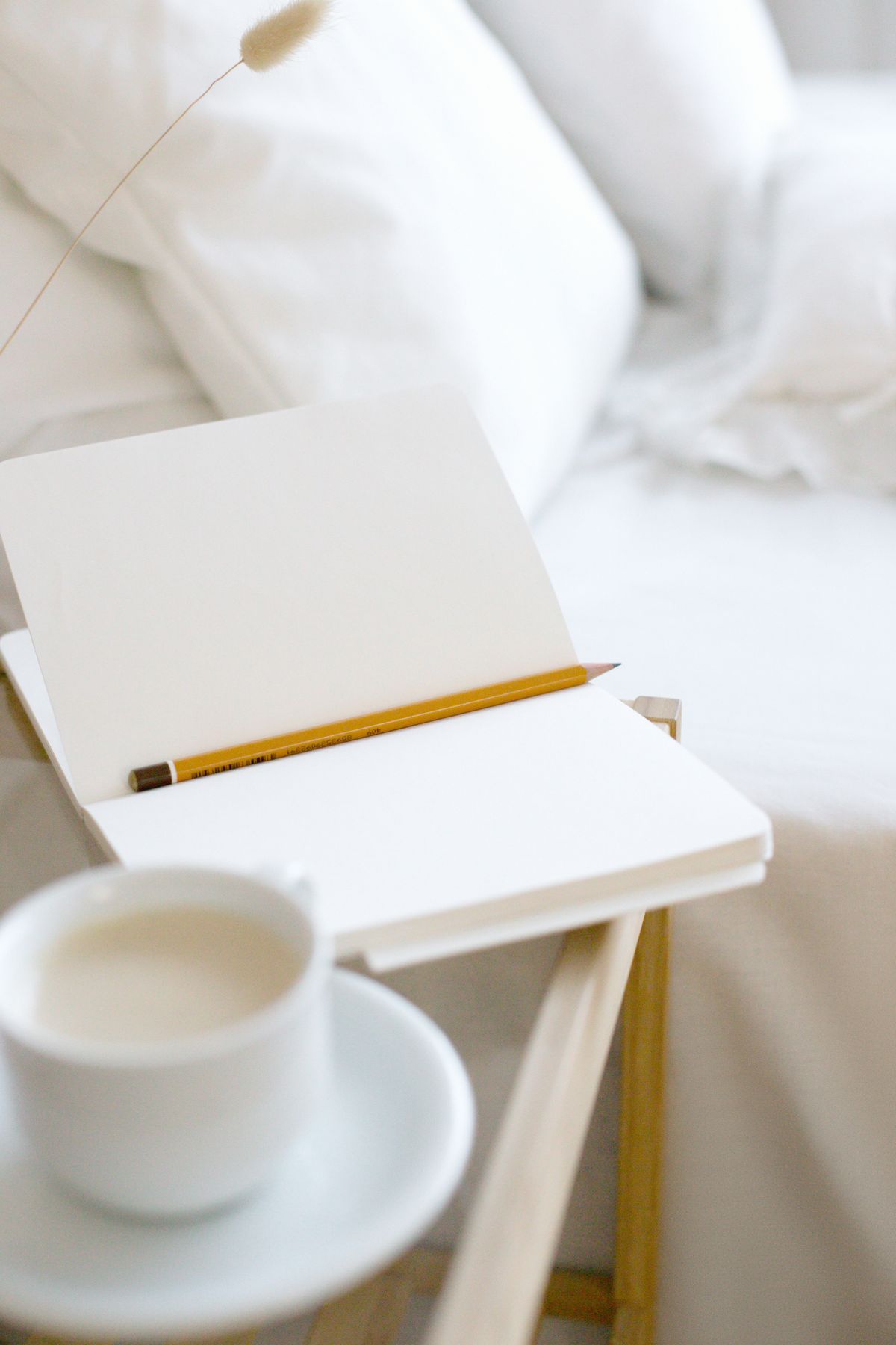 Open notebook and pencil on a table