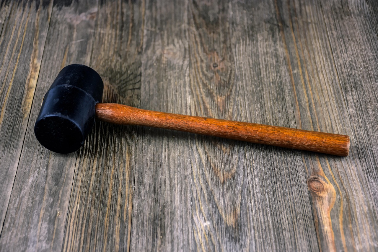 A rubber mallet on a plain surface