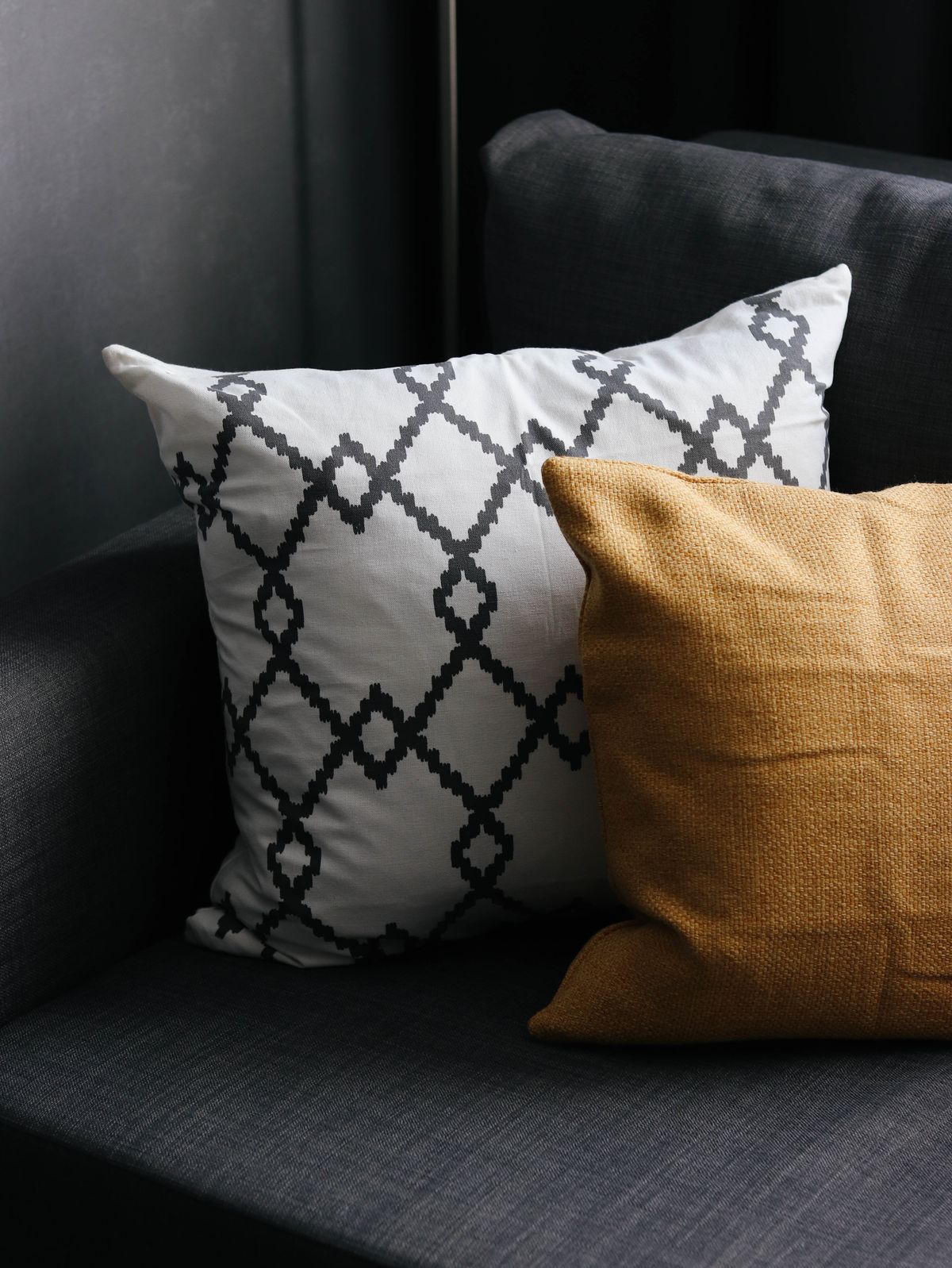 Cushions arranged on a fabric sofa