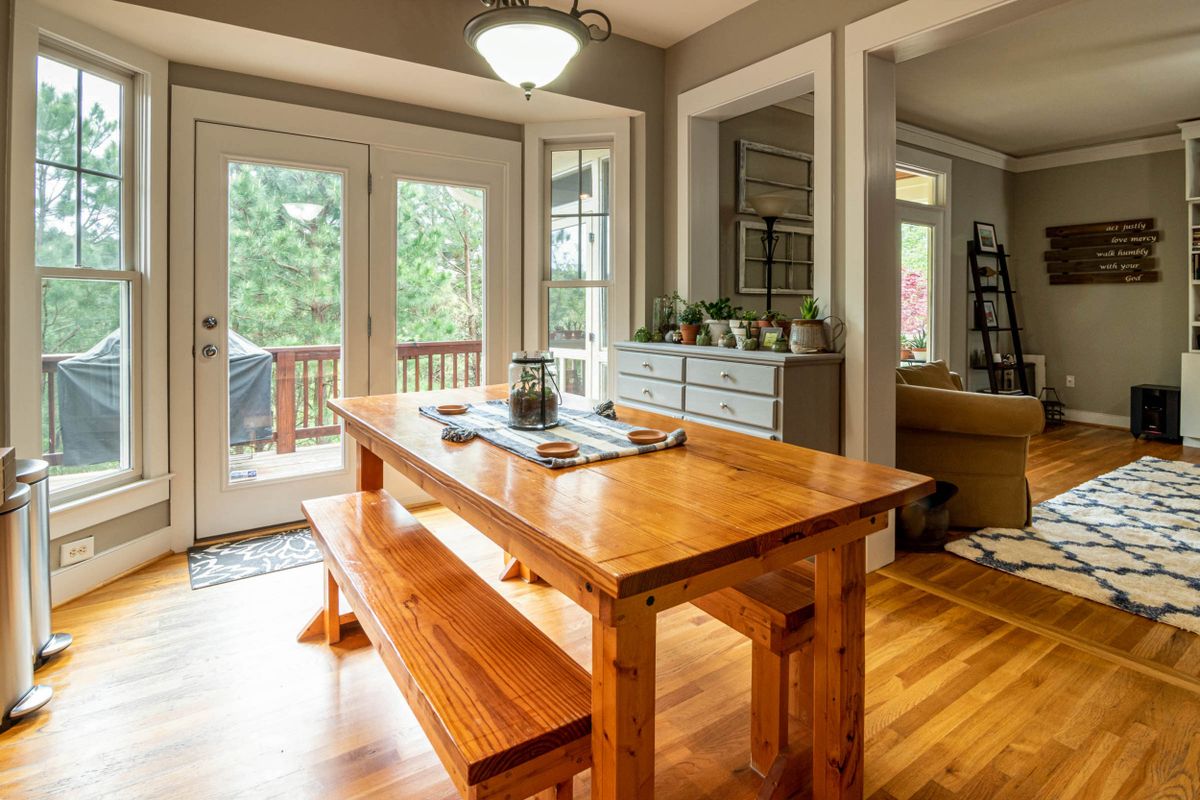 Wooden dining table in a naturally lit room